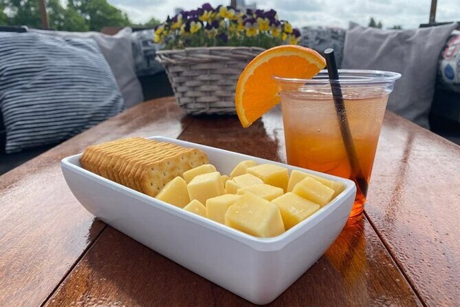Dutch Cheese and Drinks Guided Amsterdam Canal Cruise With Locals - Cultural Insights Shared
