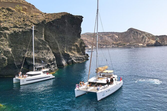 Luxury Santorini Sunset Cruise: Dinner, BBQ, Open Bar, Transfers - Booking Details