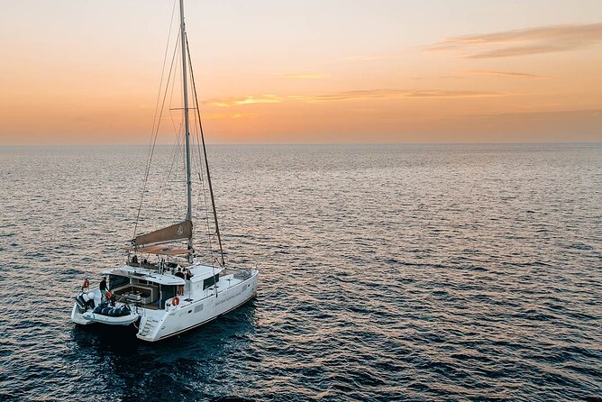 Santorini Sunset Sailing Cruise: Dinner, BBQ, Open Bar, Transfers - The Sum Up