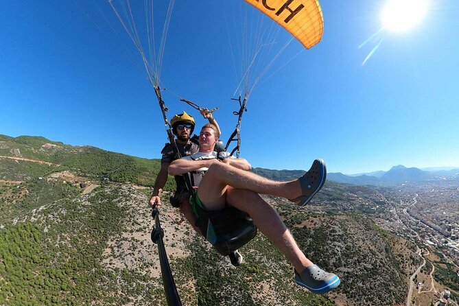 Tandem Paragliding in Alanya With Licensed Pilot - Equipment and Pilot Information