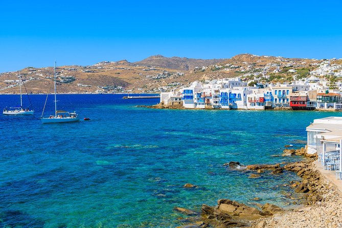 Day Private Cruise to Caldera & Hot Springs via White&Black Beach From Santorini - Price and Cancellation Policy