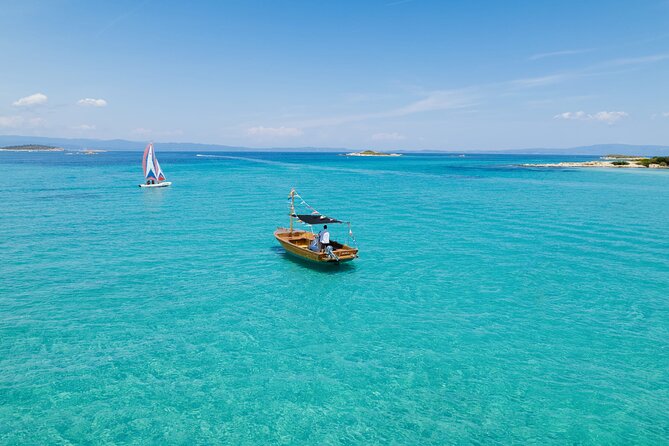 Explore Diaporos & Vourvourou: Private Wooden Boat Adventure - Cancellation Policy