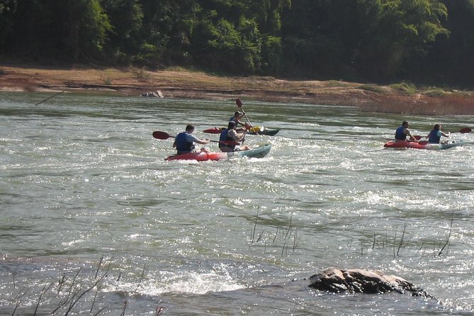 FULL DAY – Kuang Si Waterfall, Kayak on the Nam Ou / Mekong River, Pak Ou Caves - Meeting Point and Pickup