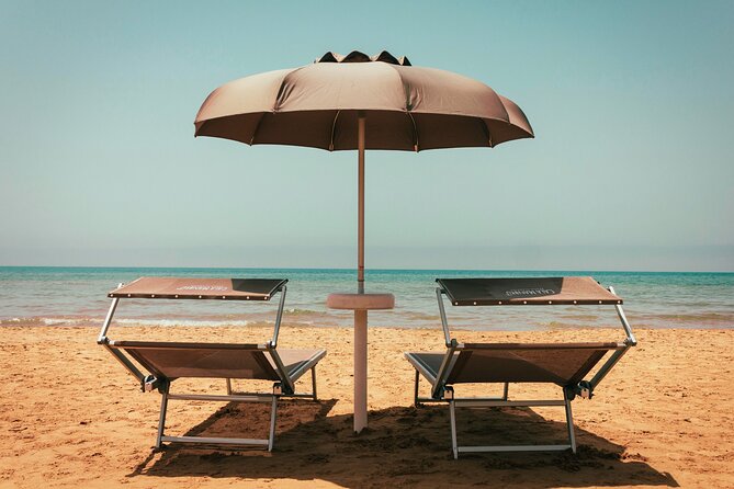 Full Day Pass to Cala Manbrù Beach Club - Reservation and Cancellation Policy