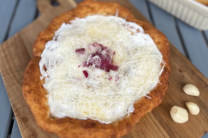 How to Make Langos: The Most Popular Hungarian Street Food - Serving and Enjoying Langos