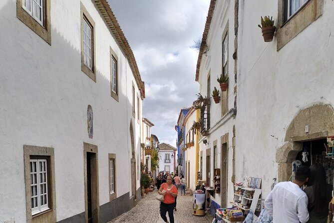 Private Transfer From Porto to Lisbon With Stops in Nazaré and Óbidos - Contact and Confirmation
