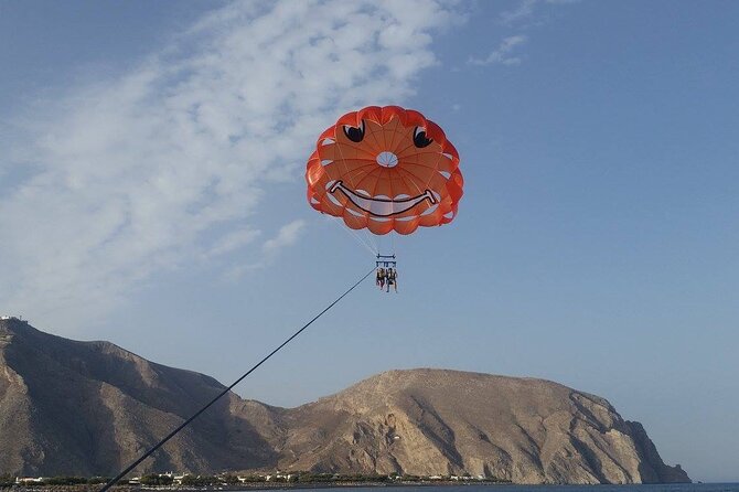 Santorini: Parasailing Flight Experience at Black Beach - Restrictions and Participation