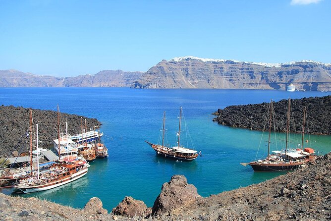 Santorini Sunset Sailing Cruise: Dinner, BBQ, Open Bar, Transfers - Booking Information