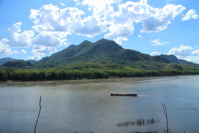 1 DAY Mekong Cruise to Pak Ou Caves. Kuang Si Waterfalls . Local Villages - Traveler Experiences