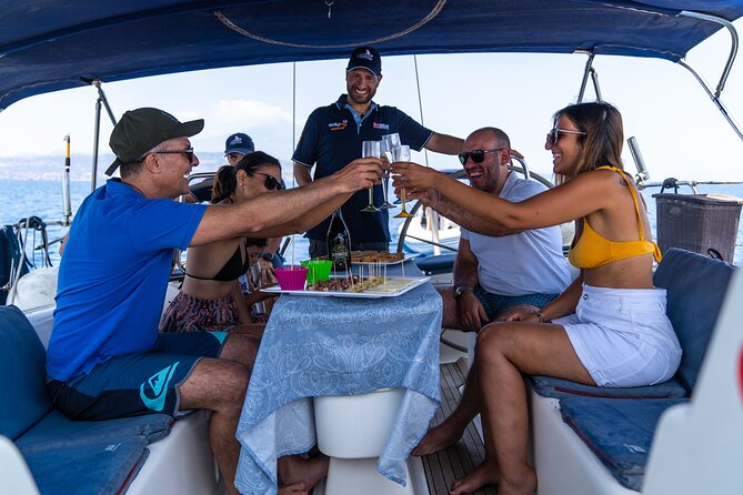Catania Boat Tour Along the Coast With Aperitif and Snorkeling - Tour Details