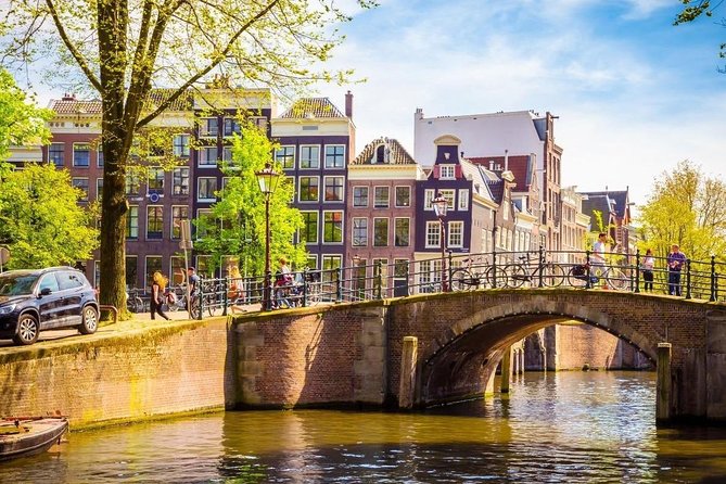 Private Tour: Highlights of Amsterdam + Zaanse Schans Village + Cheese Farm - The Sum Up