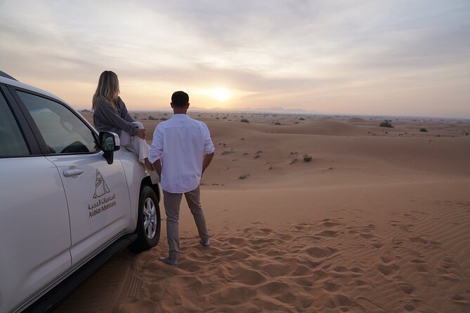 Dubai Desert Safari: Camel Ride, Sandboarding, BBQ & Spirits