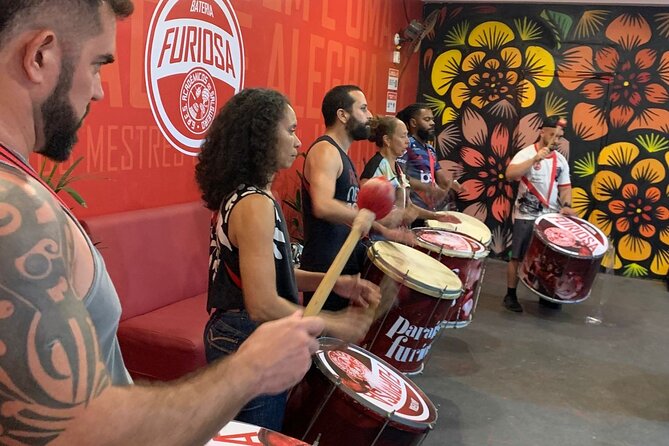 Behind the Scenes at a Samba School and Learn to Play an Instrument