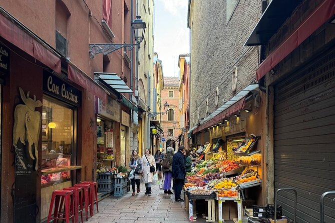 Bologna Walking Tour With Tower Sky View and Archiginnasio - Restrictions and Cancellation Policy