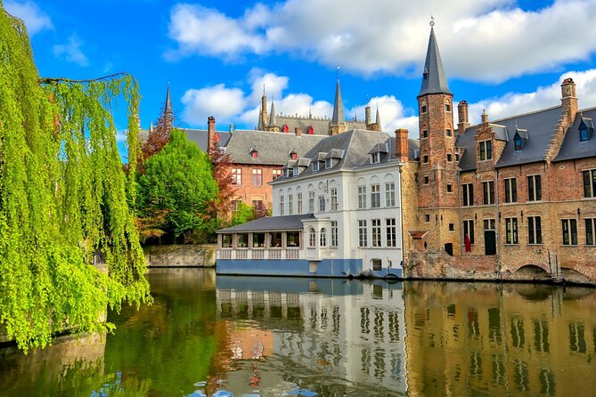 Full Day Guided Tour to Bruges by Train From Brussels - Tour Inclusions