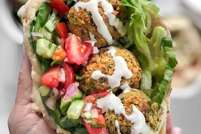 Private Eiffel Tower Tour With Falafel and Wine Tasting - Pickup and Transportation Details