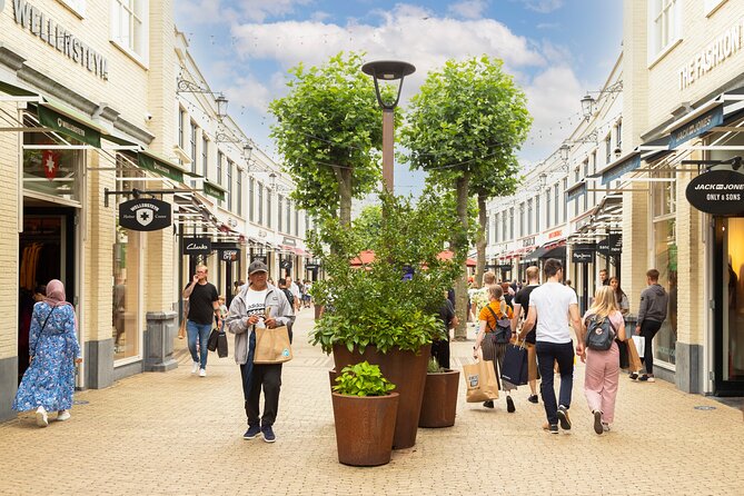 Private Shopping Tour From Amsterdam to Batavia Fashion Outlet - Tour Overview