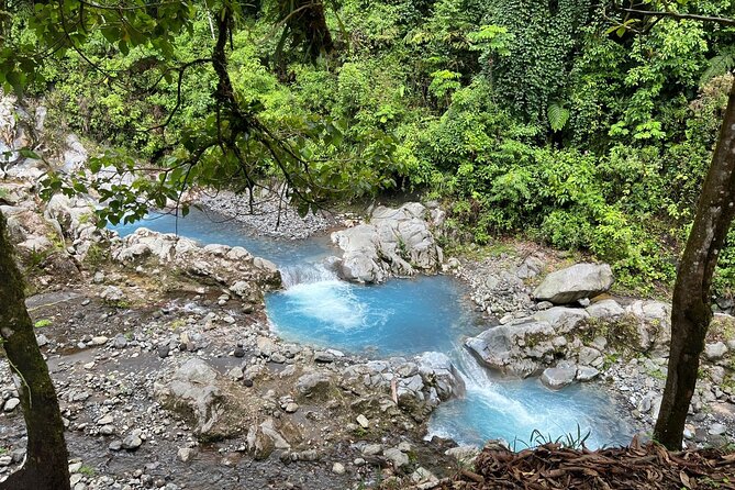 Safari Truck to the Blue Morpho Waterfall & Hotspring Incl. Luch