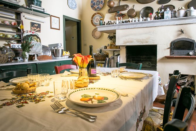 Small Group Market Tour and Dining at a Cesarinas Home Santa Teresa Di Gallura - Meeting and Pickup