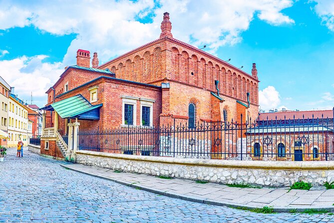 Audio-Guided, Private Electric Car City Tour in Krakow - Key Sites to Explore