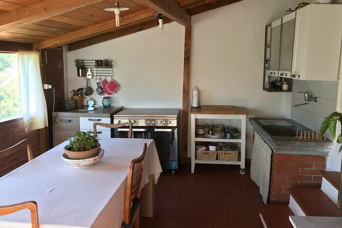 Discover the Tastes of Tuscan Home Cooking - Tuscan Home Cooking Setting and Host