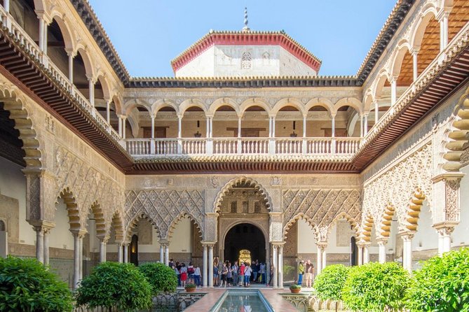 Essential Seville: Real Alcazar Guided Tour + Cathedral + Flamenco Show - Meeting Point Details