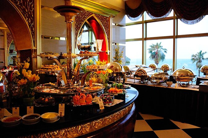 Guided Tour And Dinner at Burj Al Arab Tour From Abu Dhabi - Inclusions and Exclusions