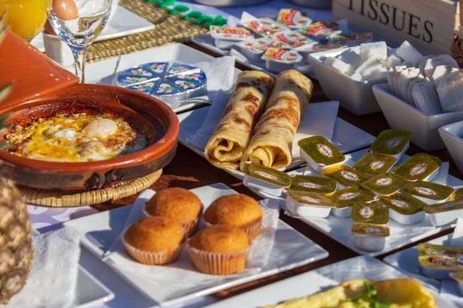 Merzouga: Overnight in Luxury Desert Camp With Camel Ride, Meals & Sandboarding - Activities: Camel Ride, Sandboarding