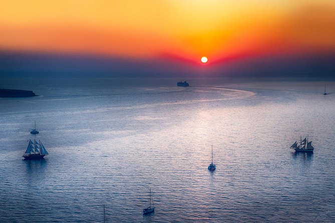 Private Catamaran Beautiful Day Around Santorini via Red Beach - Pickup and Amenities