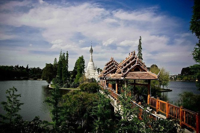 Private Day Tour to Kunming National Village and West Hill With Lunch - Tour Overview