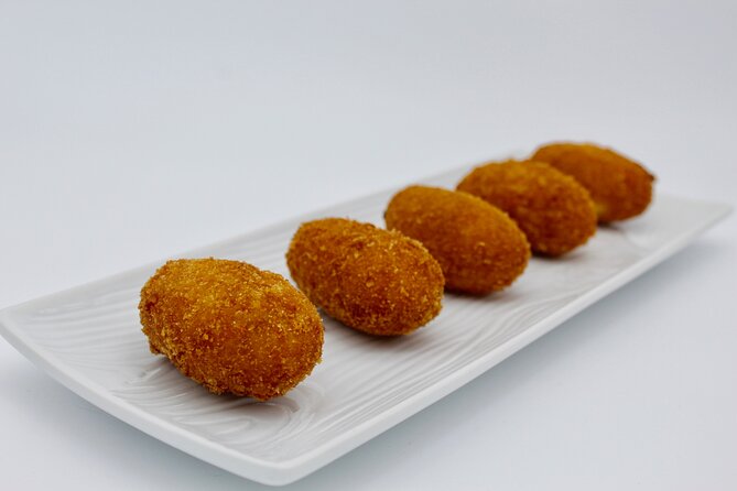 Authentic Tapas Cooking Class at a Private Local Eatery in Madrid - Booking and Pricing Information