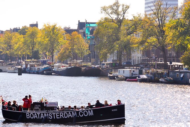 Open Boat Canal Cruise in Old City Centre of Amsterdam - Weather and Seasonal Considerations