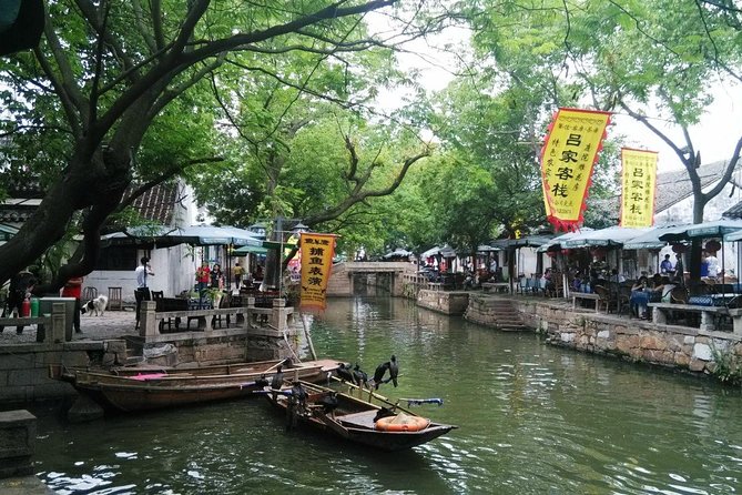 Private Tour to Suzhou Museum, Master-of-Nets Garden and Cruise in Tongli Town - Pricing and Guarantees