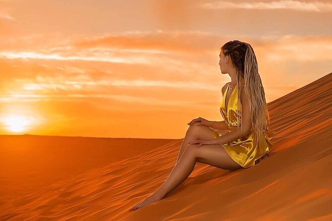 Red Dune Desert Safari Dubai Camel Ride Sandboarding & BBQ Dinner - Tour Experience