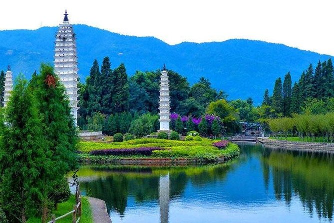 Private Day Tour to Kunming National Village and West Hill With Lunch - What to Expect