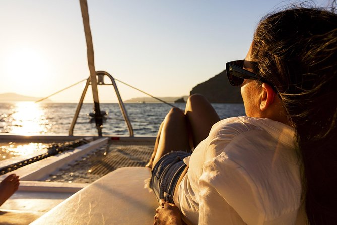 Shared Catamaran Romantic Sunset Cruise From Santorini via Volcano - Culinary Delights