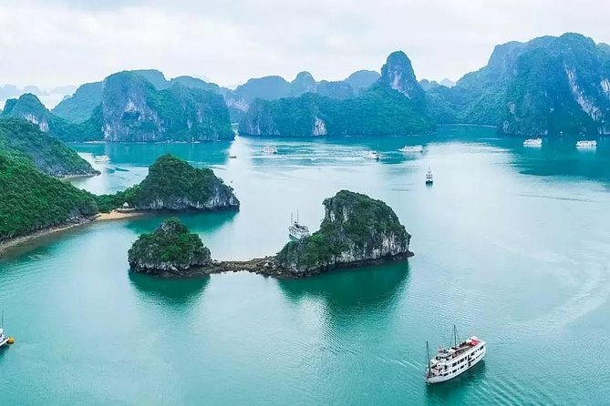 Halong Bay 1 Day Tour With Islands, Caves, Kayak & Transfer - The Sum Up