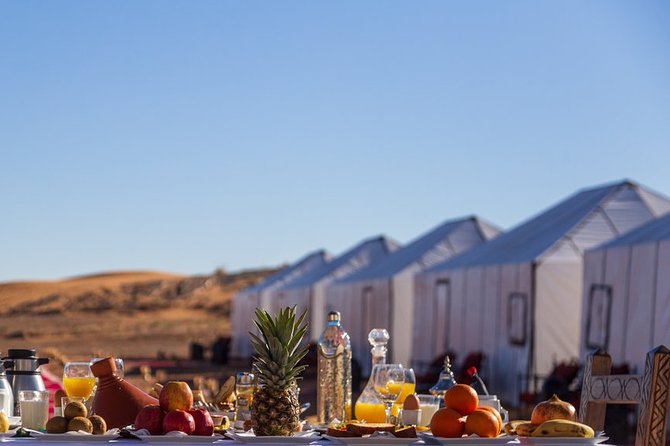Merzouga: Overnight in Luxury Desert Camp With Camel Ride, Meals & Sandboarding - Pickup Information: Various Locations in Merzouga