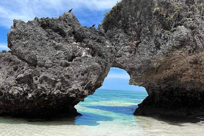 Ngonga Cave Tour; Mtende Beach; Kuza Cave Tour; Blue Lagoon Snorkeling; The Rock - Transportation and Inclusions