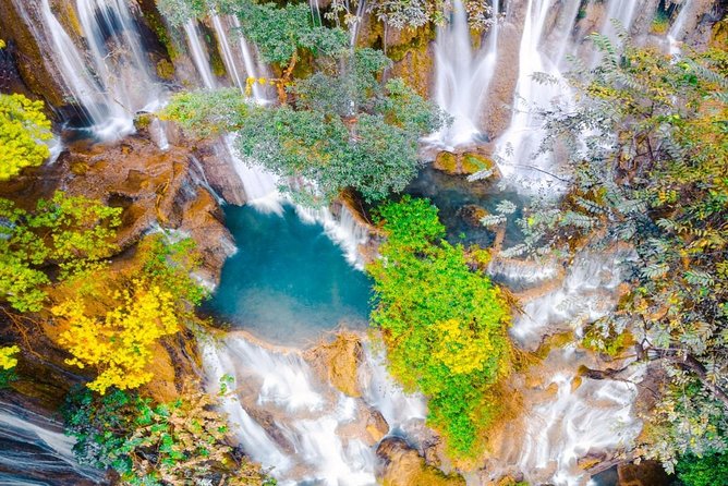 Pak Ou Caves and Kuang Si Fall Day Tour - Cancellation and Reservation
