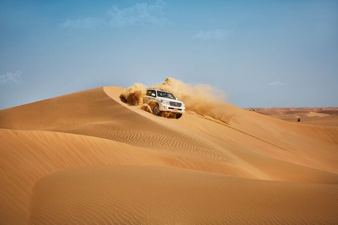 Private Romantic Dune Dinner With Quad Bike Ride in Abu Dhabi - Transportation and Pickup Details