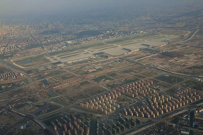 Private Transfer From Shanghai Hongqiao Airport to Shanghai City Center - Pricing and Reservation Details