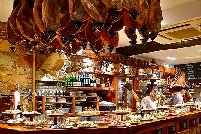 Seville Tapas and Wines Tour and Barrio Santa Cruz - Local Flavors and Wines