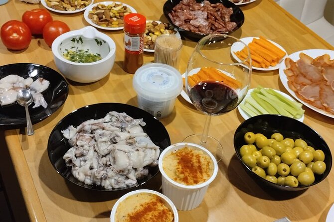 Tapas, Wine and Argentine Barbecue in Barcelona - Convenient Logistics Details