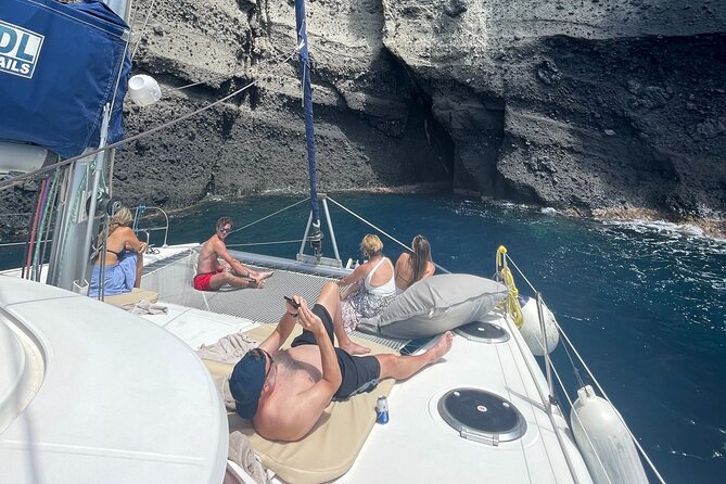 4 Days Private Catamaran Cruise 3 Cyclades Islands From Santorini - Booking and Pricing Details