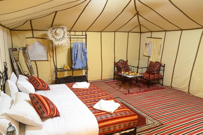 Merzouga: Overnight in Luxury Desert Camp With Camel Ride, Meals & Sandboarding - Additional Info: Confirmation, Restrictions, Group Size