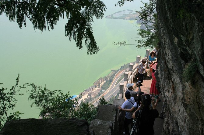 Private Day Tour to Kunming National Village and West Hill With Lunch - Cancellation Policy