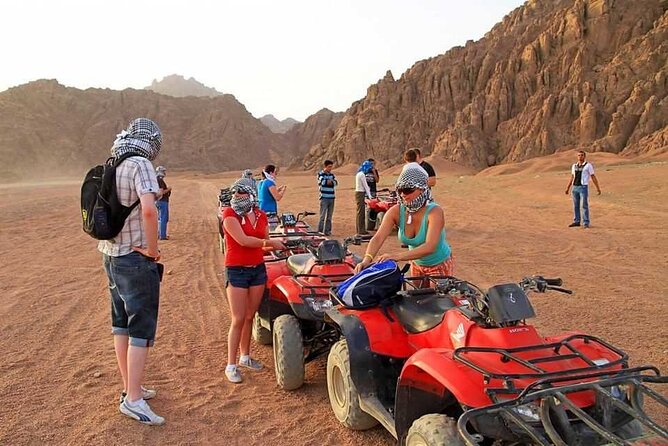 Sunset Desert Quad Bike Safari With Camel Ride and Bedouin Dinner From Hurghada - Dining Experience