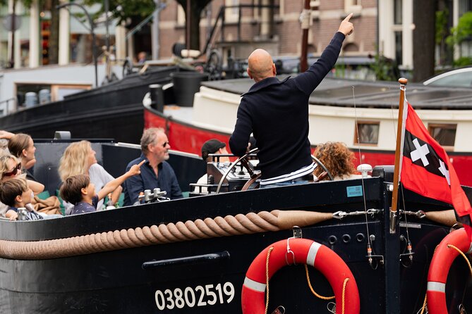 Amsterdam Open Boat Evening Canal Tour With Guide & Bar on Board - Meeting Point Details