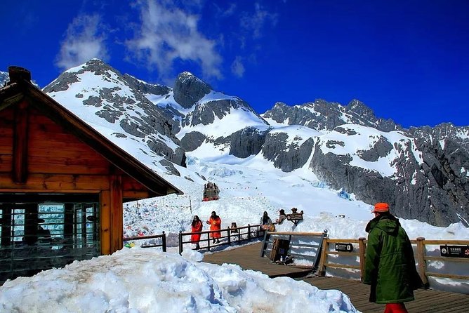 Private Day Tour Jade Dragon Snow Mountain and Baisha Village From Lijiang - Tips for a Memorable Experience